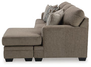 Ashley Furniture Stonemeade sofa chaise in beige fabric, showing the side view with plush cushions and a modern design.