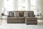 Ashley Furniture Stonemeade sofa chaise sectional, view of the comfortable chofa with plush cushions and fabric upholstery.