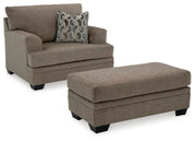 Ashley Furniture Stonemeade living room set with sofa and armchair, featuring neutral upholstery and modern design.
