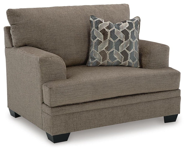 Ashley Furniture Stonemeade living room set featuring a sofa and armchair in a modern design with neutral upholstery.
