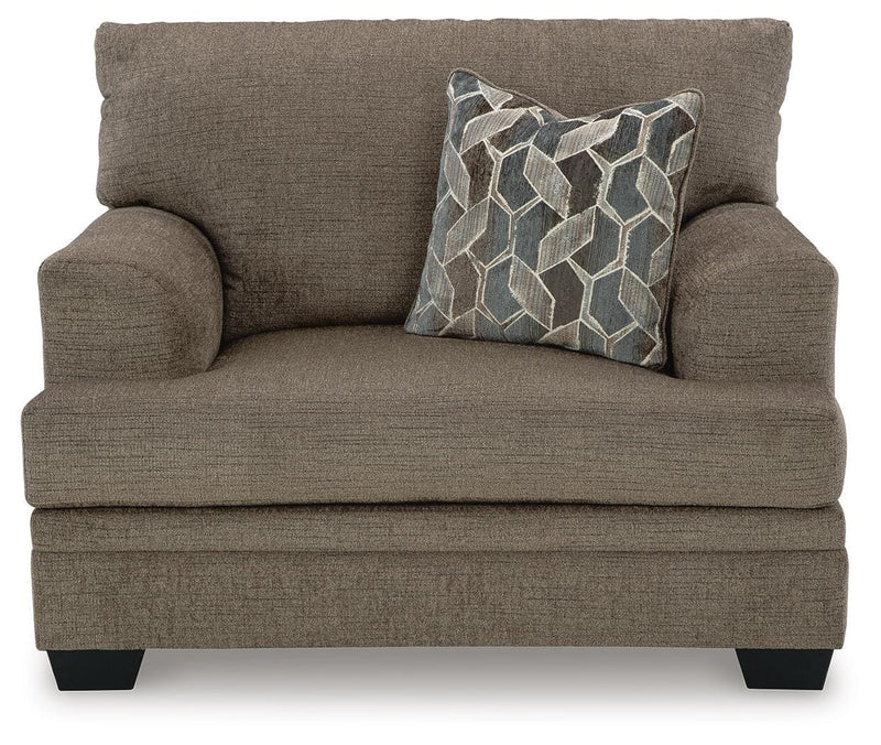 Ashley Furniture Stonemeade living room set with sofa and armchair in a modern, neutral-colored upholstery.