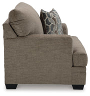 Ashley Furniture Stonemeade living room set with sofa, armchair, and coffee table in a modern design.