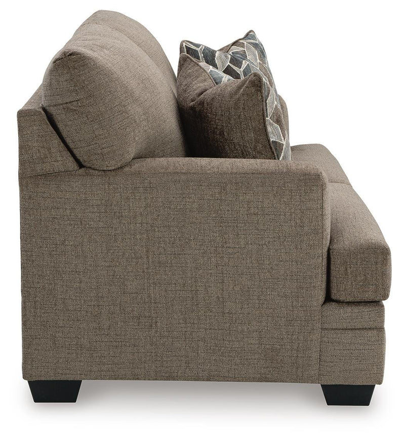 Ashley Furniture Stonemeade living room set with sofa and armchair, featuring neutral fabric and modern design.