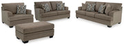 Ashley Furniture Stonemeade living room set with a sofa and armchair featuring neutral upholstery and stylish wood accents.