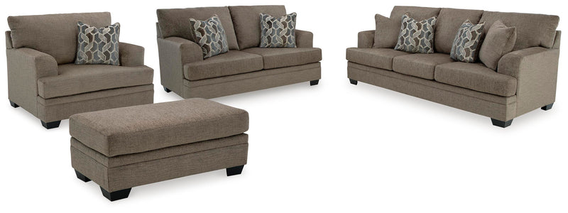 Ashley Furniture Stonemeade living room set with a sofa and armchair featuring neutral upholstery and stylish wood accents.