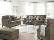 Ashley Furniture Stonemeade living room set with sofa and armchair, featuring neutral fabric and plush cushions in a modern style.