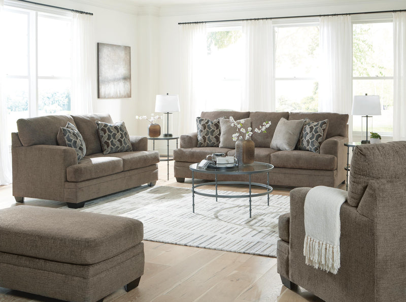 Ashley Furniture Stonemeade living room set with sofa and armchair, featuring neutral fabric and plush cushions in a modern style.