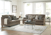 Ashley Furniture Stonemeade living room set with sofa and armchair, featuring neutral fabric upholstery and contemporary design.