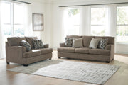 Ashley Furniture Stonemeade living room set with sofa and armchair, featuring neutral upholstery and modern design.