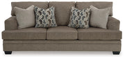 Ashley Furniture Stonemeade living room set featuring a sofa and loveseat with neutral upholstery and stylish cushions.