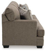 Ashley Furniture Stonemeade living room set with sofa and armchair, featuring neutral upholstery and modern design.