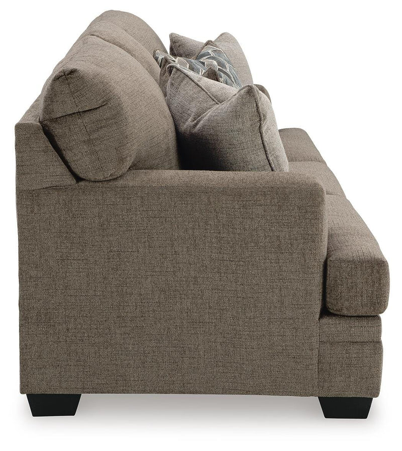 Ashley Furniture Stonemeade living room set with sofa and armchair, featuring neutral upholstery and modern design.