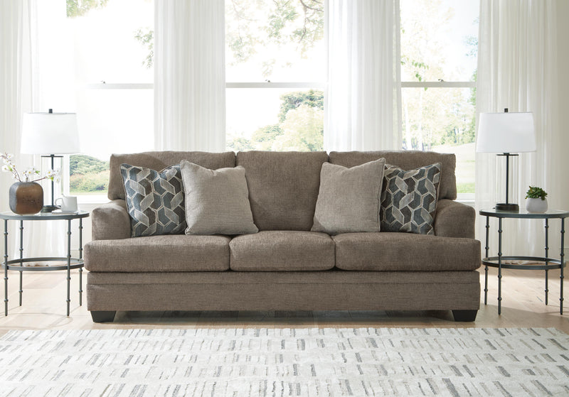 Ashley Furniture Stonemeade living room set with a sofa, loveseat, and armchair in a cozy, modern living room arrangement.