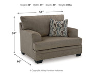 Ashley Furniture Stonemeade living room set featuring a sofa and loveseat with plush cushions and neutral fabric upholstery.