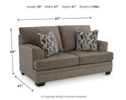 Ashley Furniture Stonemeade living room set with sofa and armchair in a modern, cozy living space.
