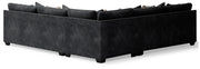 Ashley Furniture Lavernett living room set with sofa and armchair, shown from the back in a modern living space.