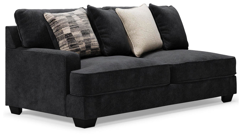 Ashley Furniture Lavernett living room set with sofa and armchair, featuring neutral upholstery and modern design.