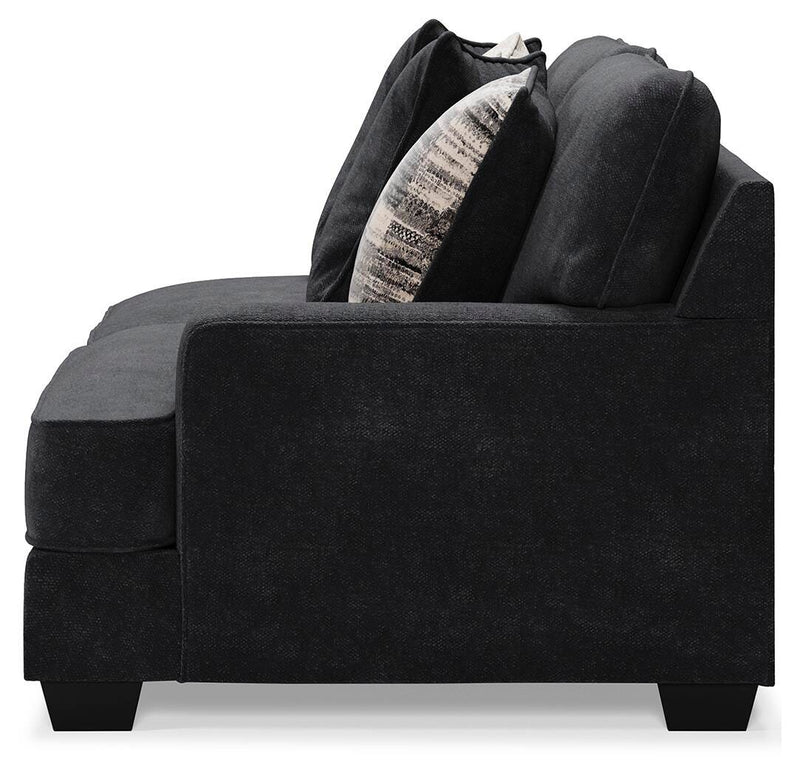 Ashley Furniture Lavernett living room set with plush sofa and matching armchair, featuring neutral fabric and modern design.