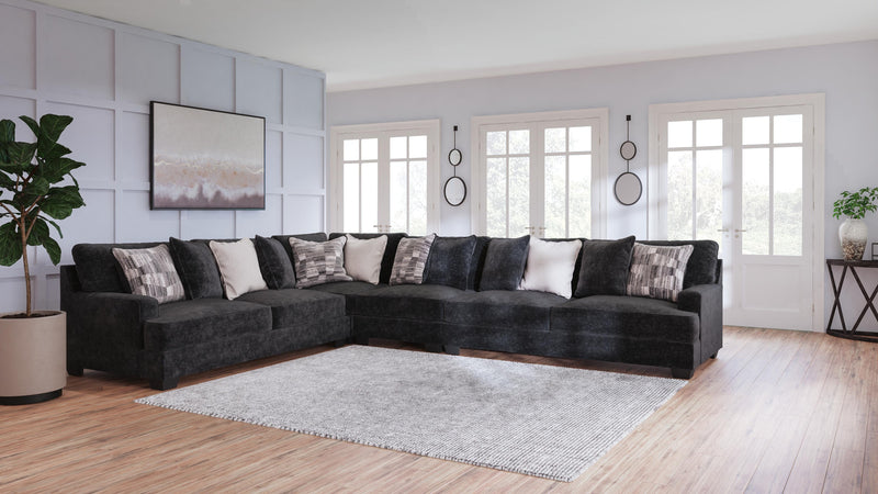 Ashley Furniture Lavernett living room set featuring a sofa, loveseat, and armchair with neutral upholstery and modern design.