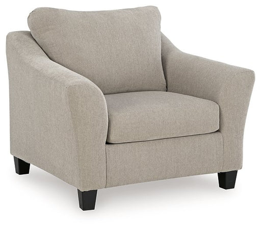 Ashley Furniture Willarae oversized chair with plush fabric and wide armrests, angled view showcasing comfortable, modern living room style.