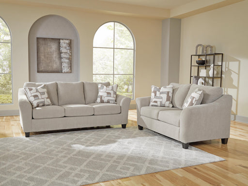 Ashley Furniture Willarae living room set with sofa and loveseat, featuring plush cushions and modern design.