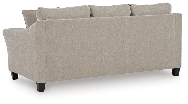 Willarae Sofa Sleeper by Ashley Furniture showing the back view with plush cushions and modern design in a living room setting.