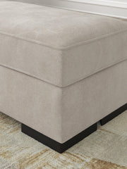 Ashley Furniture high profile chair and ottoman living room set with plush cushions and modern design, shown in a stylish room setting.