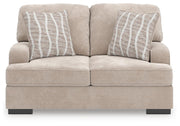 Ashley Furniture high profile loveseat with plush cushions and wide armrests, shown from a front head-on view.
