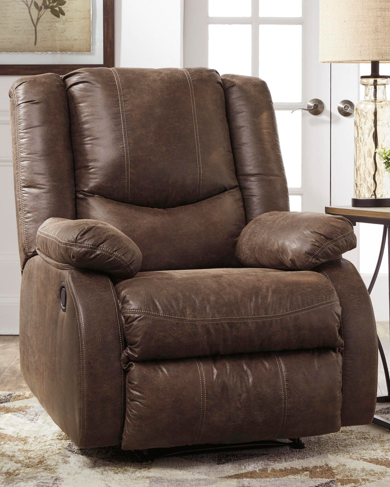 Ashley Furniture Bladewood recliner showing plush beige upholstery and padded armrests in a cozy living room setting.