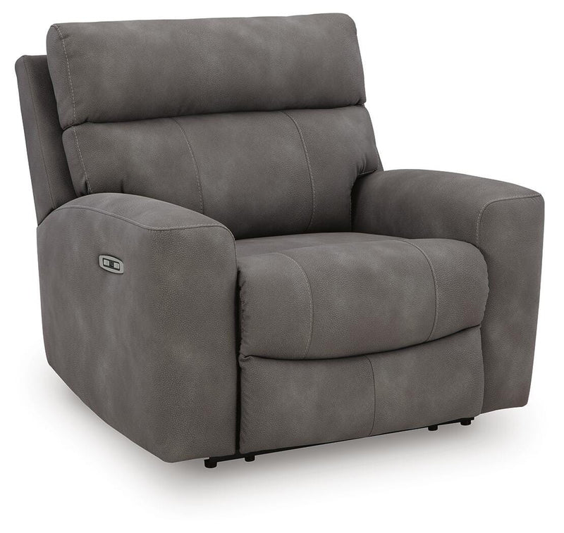 Next-Gen DuraPella Power Recliner by Ashley Furniture, shown from an angled view with closed recline in a modern living room setting.