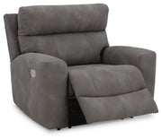 Open Ashley Furniture Next-Gen DuraPella power recliner showing plush upholstery, padded armrests, and reclining mechanism.