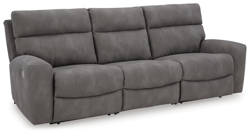Ashley Furniture Next-Gen DuraPella power reclining sectional sofa shown from an angle with plush cushions and modern design.