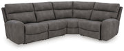 Ashley Furniture Next-Gen DuraPella Power Reclining Sectional with plush cushions and modern design, shown in a spacious living room setting.