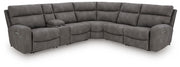 Ashley Furniture Next-Gen DuraPella Power Reclining Sectional with plush upholstery and multiple reclining seats in a modern design.