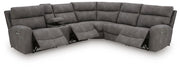 Ashley Furniture Next-Gen DuraPella power reclining sectional with plush cushions and modern design, shown open with chaise lounge.