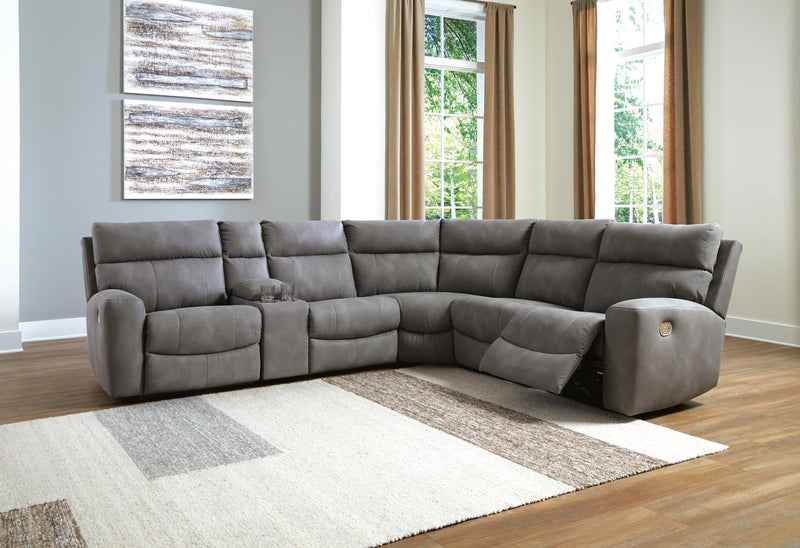 Ashley Furniture Next-Gen DuraPella power reclining sectional with plush cushions and modern design, shown in an open position.