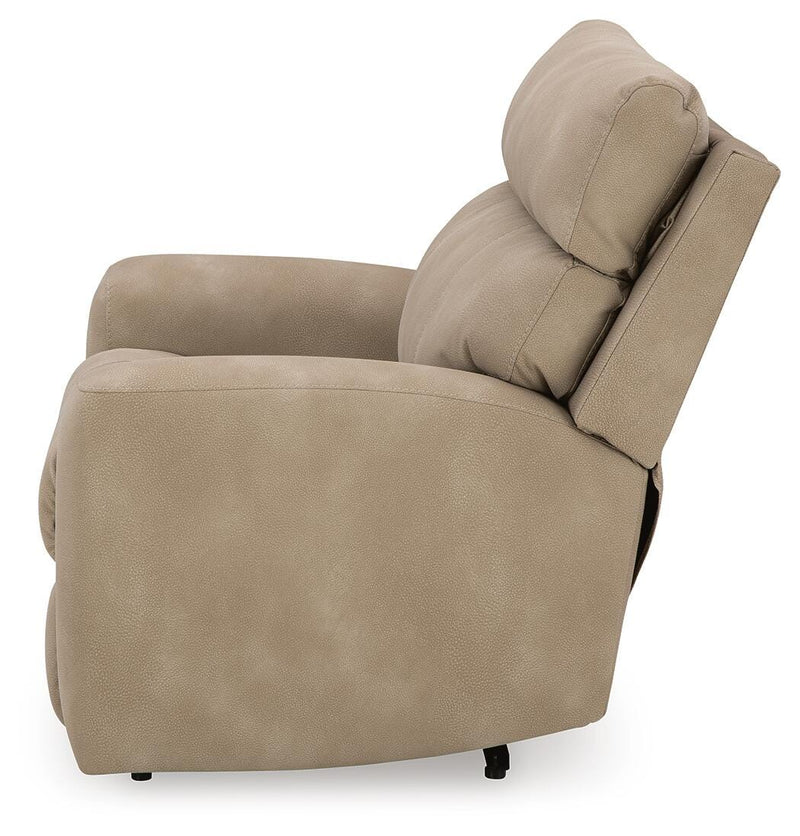 Ashley Furniture Next-Gen DuraPella Power Recliner showing plush beige fabric, padded armrests, and built-in recline controls.