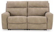 Ashley Furniture Next-Gen DuraPella living room set with plush sofas and armchair, in a modern design with neutral upholstery.
