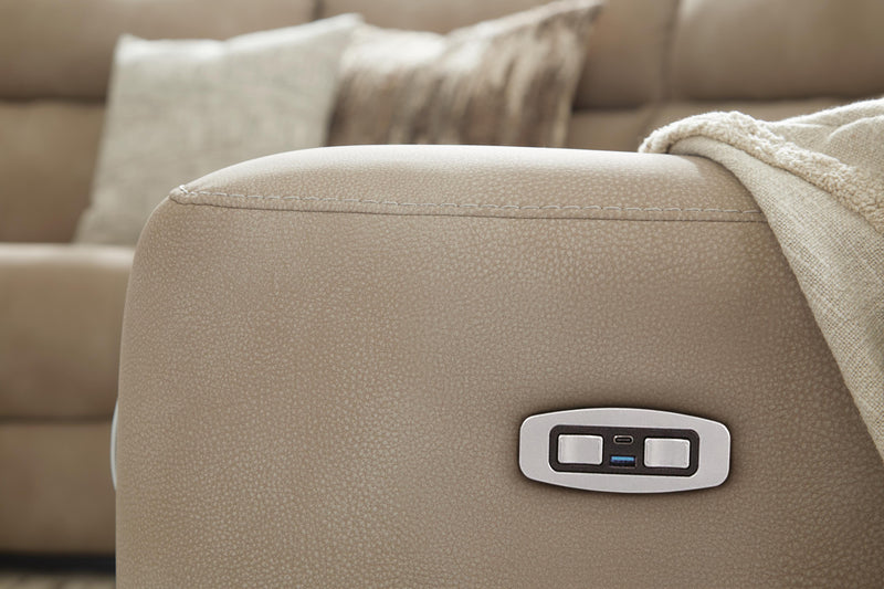 Close-up of the Ashley Furniture Next-Gen DuraPella Power Reclining Sectional showing USB charging ports and plush fabric details.