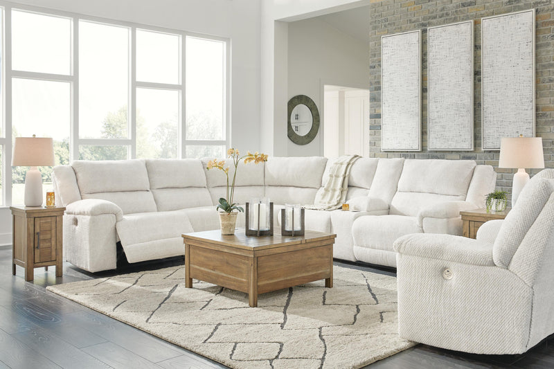 Ashley Furniture Keensburg living room set with a sofa and loveseat, upholstered in neutral fabric, assembled in a modern style.