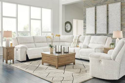 Ashley Furniture Keensburg living room set with a sofa and loveseat, upholstered in neutral fabric, assembled in a modern style.