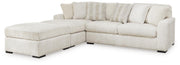 Ashley Furniture Chessington living room set with sofa and armchair in a modern design, shown in a cozy home setting.