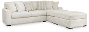 Ashley Furniture Chessington living room set with sofa and armchair in a modern design, featuring plush upholstery and wooden accents.