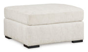 Ashley Furniture Chessington Living Room Set with sofa and loveseat, featuring neutral fabric and modern design.
