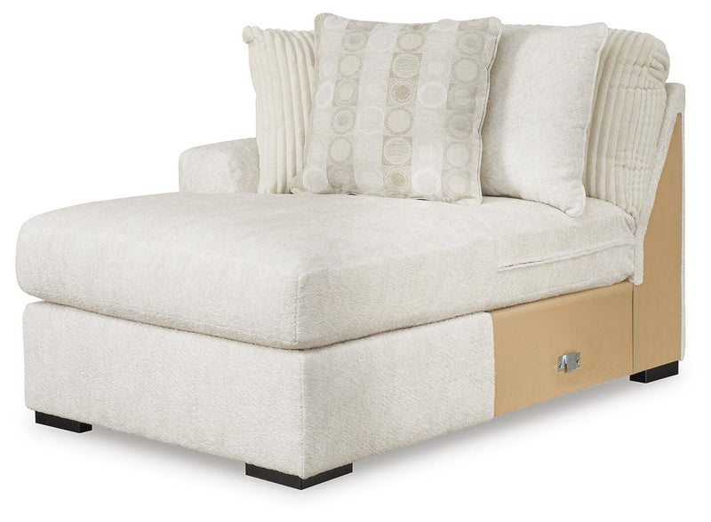 Ashley Furniture Chessington sectional with double chaise, showing beige fabric upholstery and modern living room arrangement