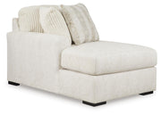 Ashley Furniture Chessington living room set featuring a sofa, loveseat, and coffee table arranged in a modern living space.