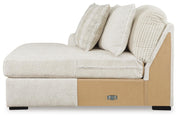 Ashley Furniture Chessington sectional with a double chaise, featuring plush cushions and modern design in a cozy living room setting.