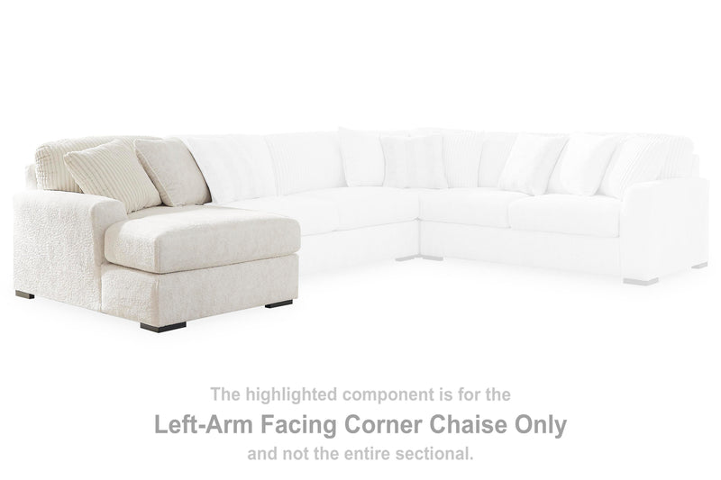 Ashley Furniture Chessington sectional with double chaise, beige fabric, plush cushions, and modern design for comfortable living room seating.