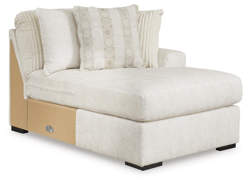 Ashley Furniture Chessington sectional sofa with double chaise, featuring plush upholstery and modern design in an angled view.