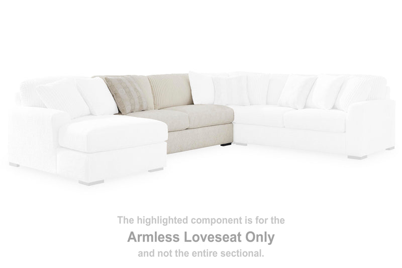 Ashley Furniture Chessington sectional with double chaise, featuring plush cushions and modern design in a cozy living room setup.